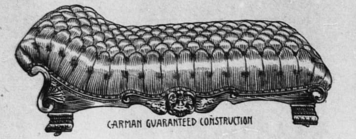 A black and white line art drawing of a chaise longue from 1904. Text below couch reads Carman Guaranteed Construction. 